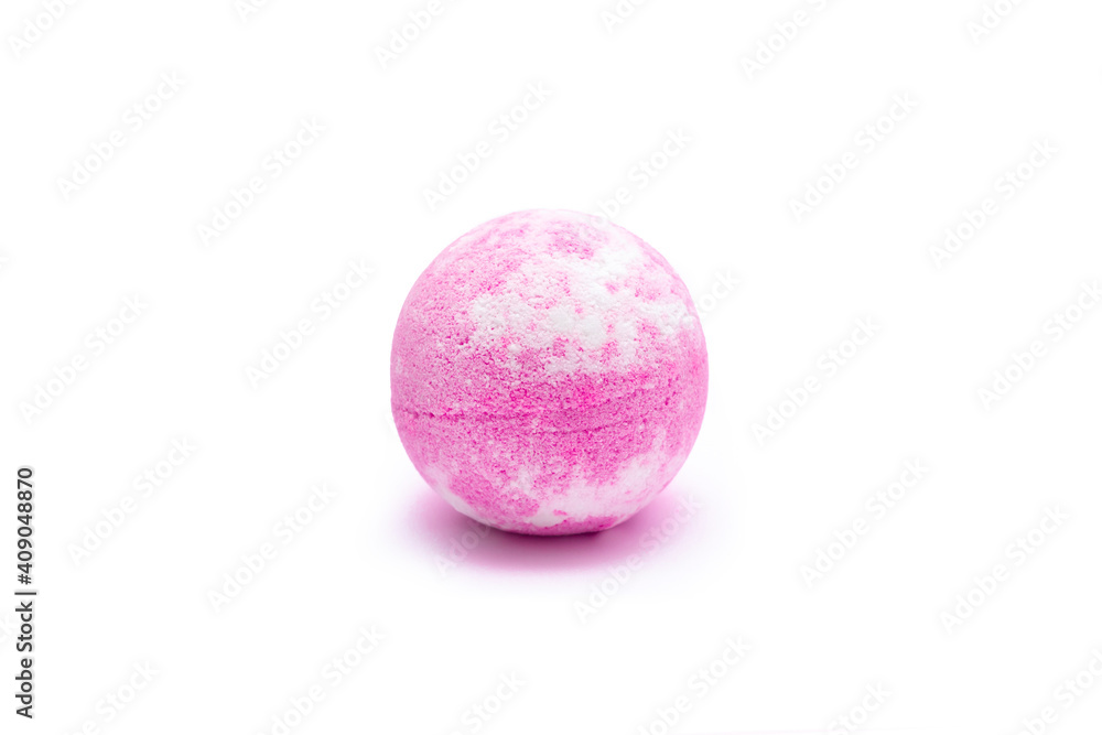 Aroma pink bubbling round bright bath bomb isolated on a white background. Close-up of bath salts Aroma pink bubbling round bright bath bomb isolated on a white background. Close-up of bath salts