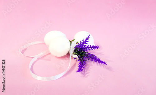 Colorful Easter eggs with spring blossom flowers