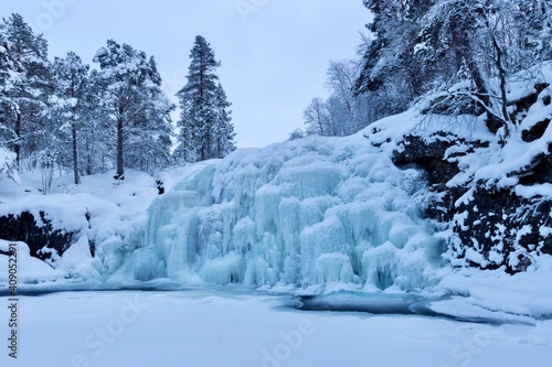 A frozen waterfall in a winter wonderland