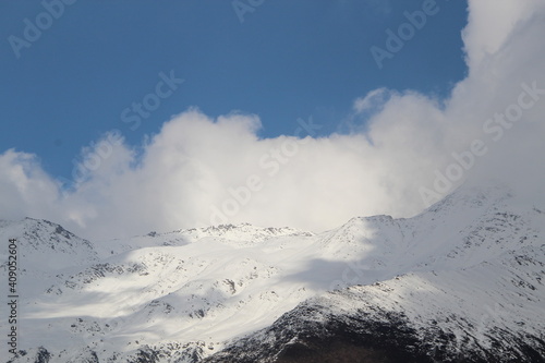 snow covered mountain peaks © mirebel