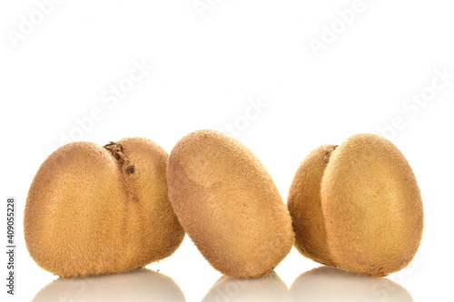 Several juicy organic kiwis  close up  isolated on white.