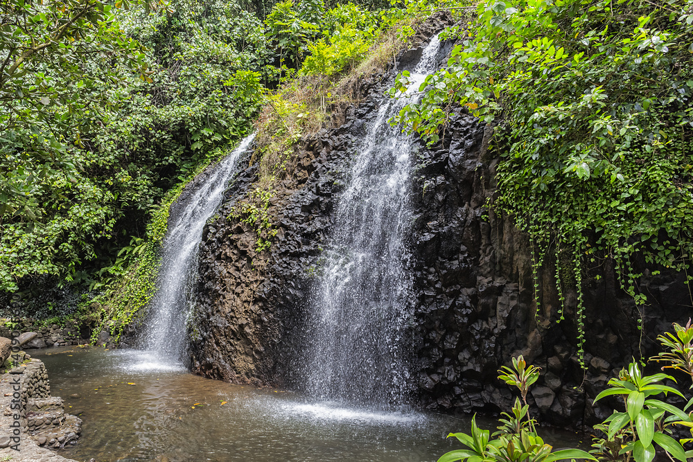 Idyllic Tropical Waterfall on the island of Tahiti, French Polynesia. Pacific Ocean.