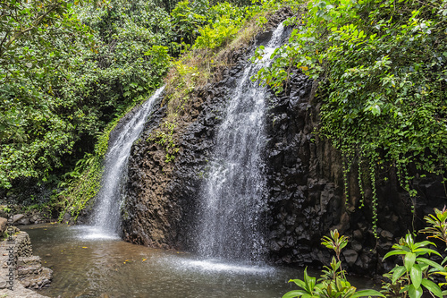 Idyllic Tropical Waterfall on the island of Tahiti  French Polynesia. Pacific Ocean.