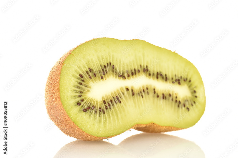 One half of a natural organic kiwi, close up, isolated on white.