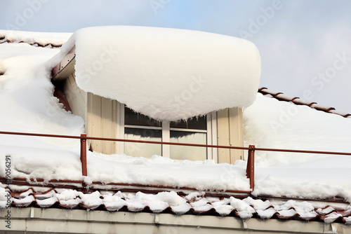 Photography Lot of snow on the window in roof at winter
