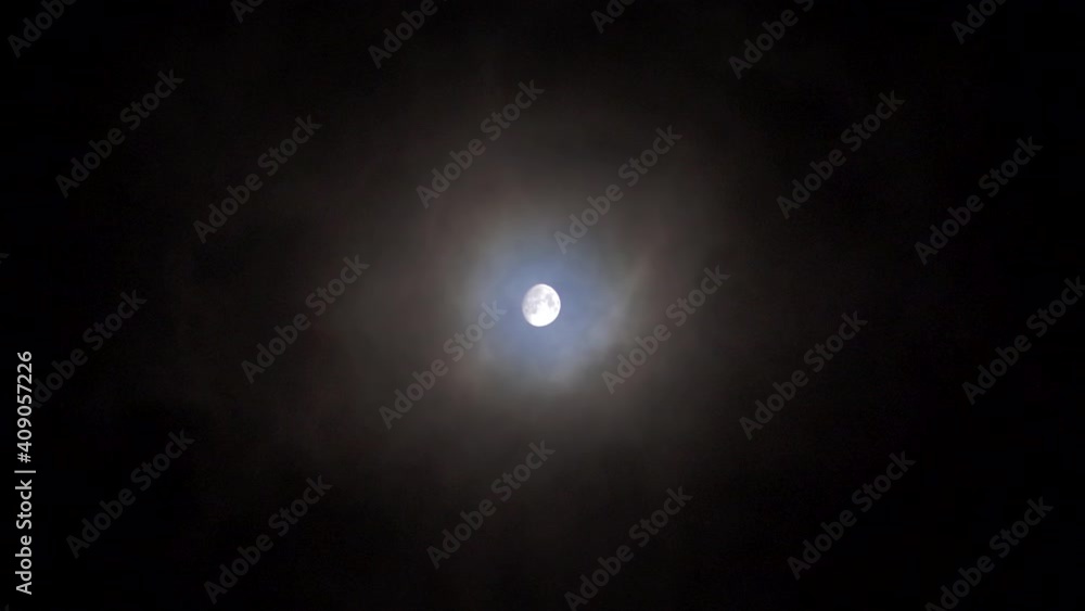 Bright Moon Shines through Gently Moving Fog Bright Moon Shines through Gently Moving Fog