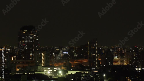 Wallpaper Mural TOKYO, JAPAN : Aerial high angle sunset CITYSCAPE of TOKYO and MOUNT FUJI. View of apartment, houses at residential area. Japanese city life and nature concept. Time lapse tracking shot dusk to night. Torontodigital.ca