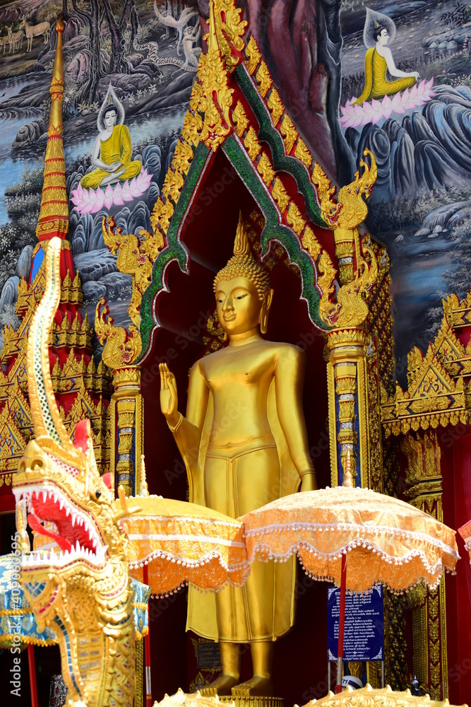 Fototapeta premium Golden statue of buddha in temple, Thailand