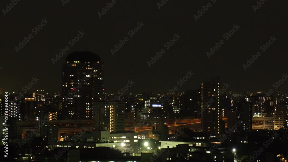TOKYO, JAPAN : Aerial high angle sunset CITYSCAPE of TOKYO and MOUNT FUJI. View of apartment, houses at residential area. Japanese city life and nature concept. Time lapse zoom in shot dusk to night. TOKYO, JAPAN : Aerial high angle sunset CITYSCAPE of TOKYO and MOUNT FUJI. View of apartment, houses at residential area. Japanese city life and nature concept. Time lapse zoom in shot dusk to night.