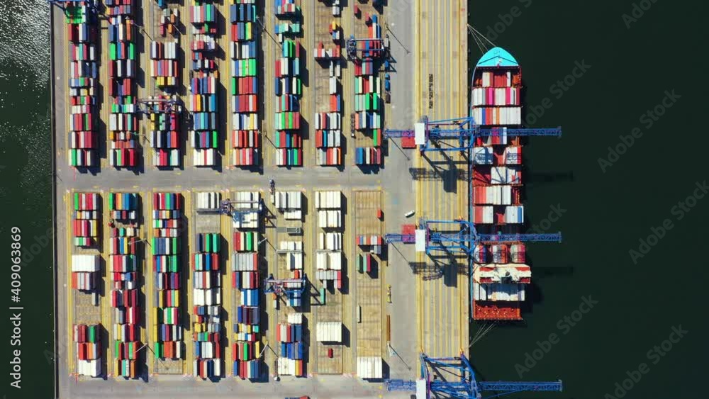 Container ship in export and import business and logistics. Shipping cargo to harbor by crane. Water transport International. Aerial view and top view. Container ship in export and import business and logistics. Shipping cargo to harbor by crane. Water transport International. Aerial view and top view.