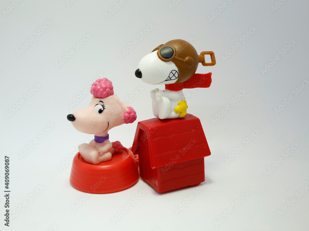 Snoopy and his girlfriend. Pink dog. Snnopy aviator chasing girl