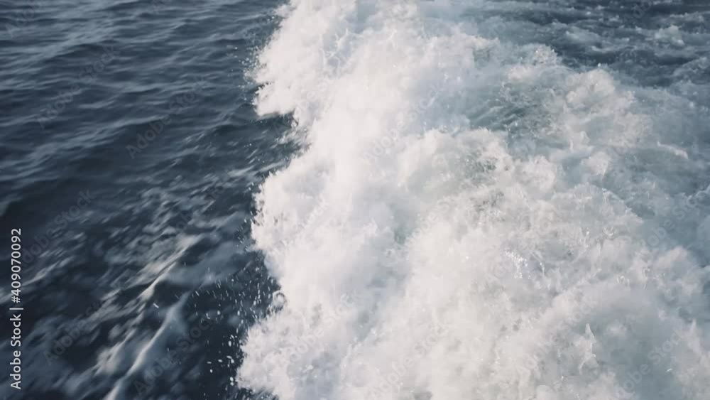 A small wave made by a boat engine. A small wave made by a boat engine.