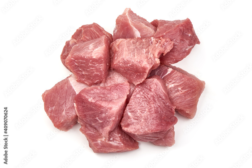 Raw pork pieces, ingredients for goulash, isolated on white background Raw pork pieces, ingredients for goulash, isolated on white background