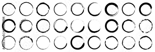 Set of grunge circles. Abstract black paint brushstroke circles pack.Set of vector black circles. Black spots on white background isolated. Vector illustration.