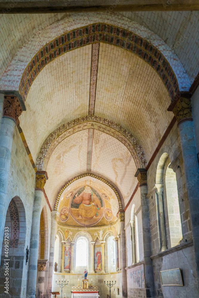 In the hamlet of Chateroy (Auvergne, France), inside the Saint Pierre church, delicate frescos cover the walls and ceiling