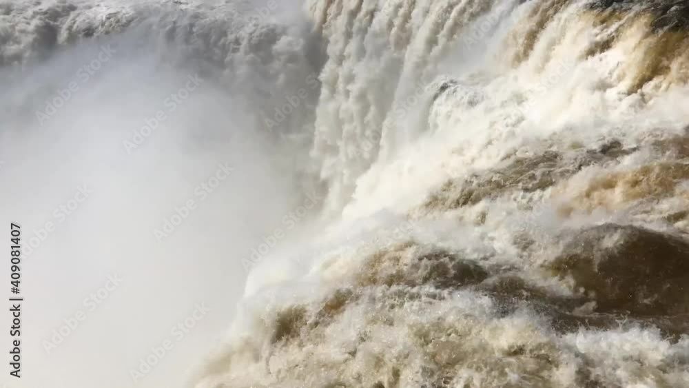 Iguazu Fa Iguazu Falls are waterfalls of the Iguazu River on the border between Argentina and Brazil. They are the largest waterfall system in the world. Iguazu Fa Iguazu Falls are waterfalls of the Iguazu River on the border between Argentina and Brazil. They are the largest waterfall system in the world.