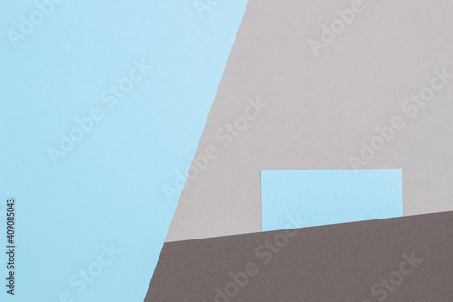 Abstract geometric texture background of pastel blue and gray tone color paper. Top view