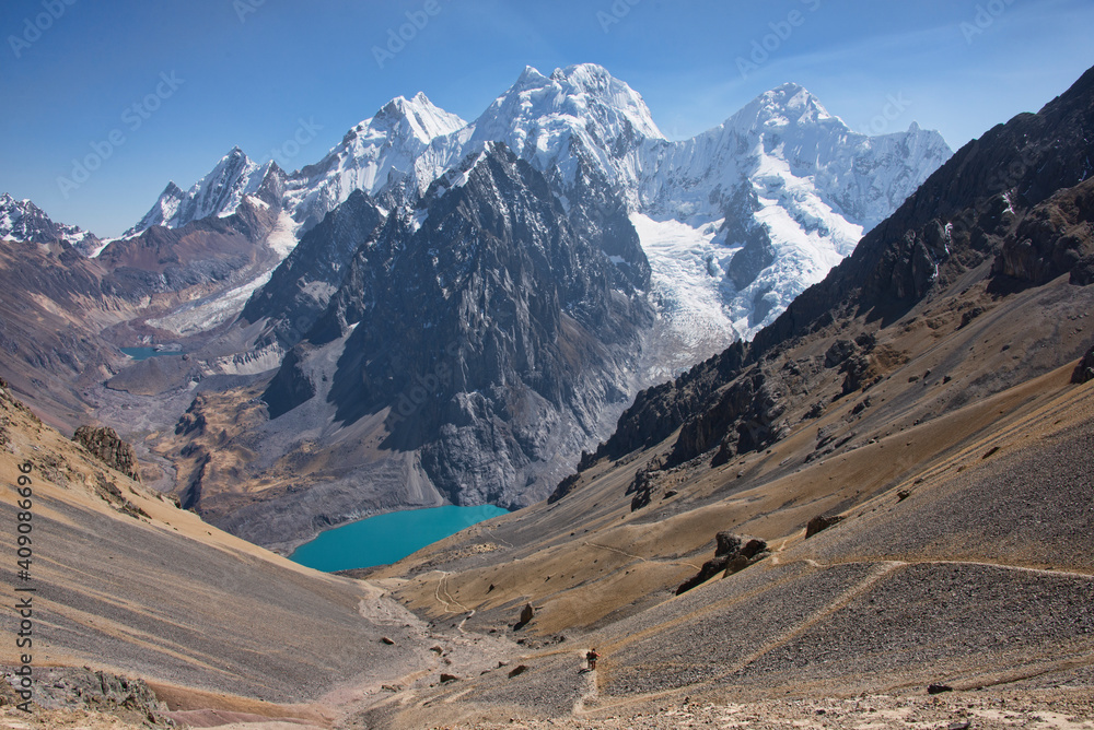 Trekker descending Santa Rosa Pass on the Cordillera Huayhuash circuit, Ancash, Peru