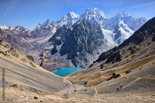 Trekker descending Santa Rosa Pass on the Cordillera Huayhuash circuit, Ancash, Peru