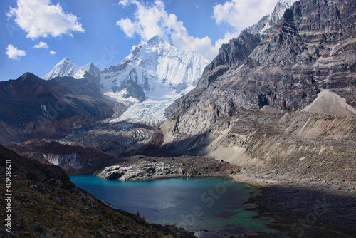 Incredible view of Yerupajá from above Siula Grande Base Camp with Laguna Sarapacocha on the Cordillera Huayhuash circuit, Ancash, Peru