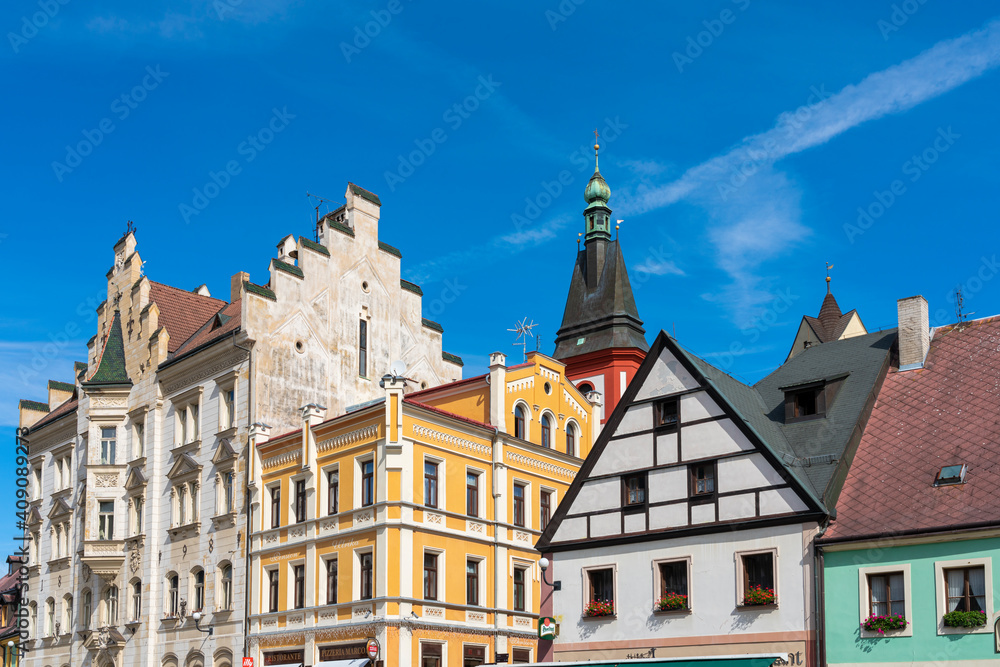 Low angle view of tops of houses at Marketplace square in Loket, Sokolov District, Karlovy Vary Region, Bohemia, Czech Republic Low angle view of tops of houses at Marketplace square in Loket, Sokolov District, Karlovy Vary Region, Bohemia, Czech Republic