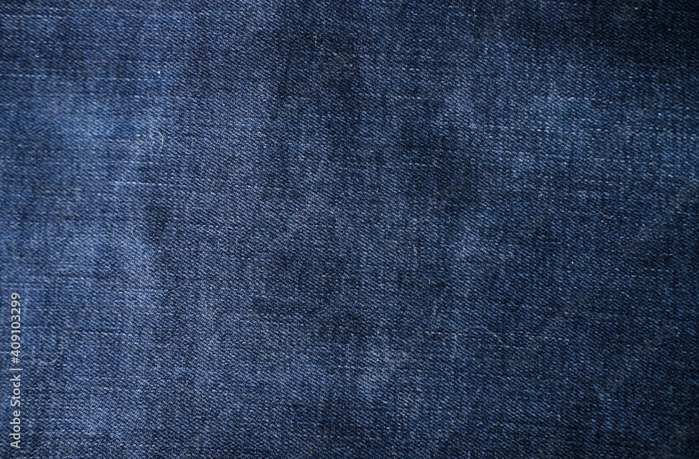 Macro shot of blue denim, jean. Modern dress textile, detailed fashion material. Macro shot of blue denim, jean. Modern dress textile, detailed fashion material.