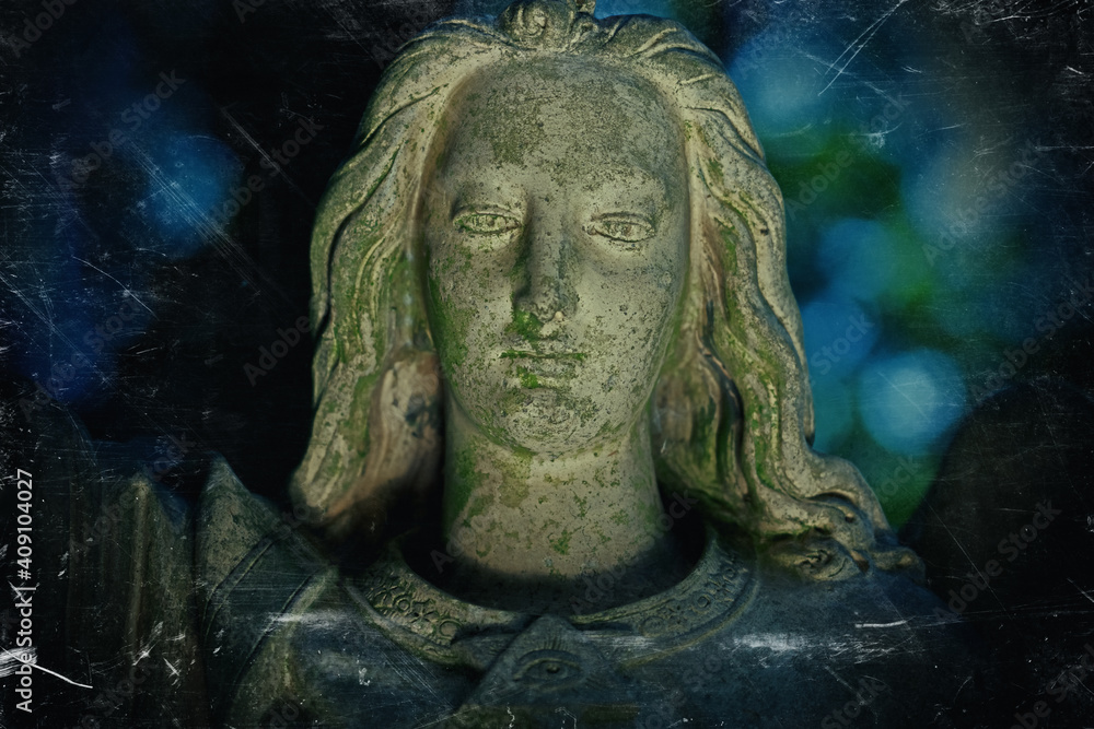 Angel of peace. Retro styled image of an ancient stone statue.