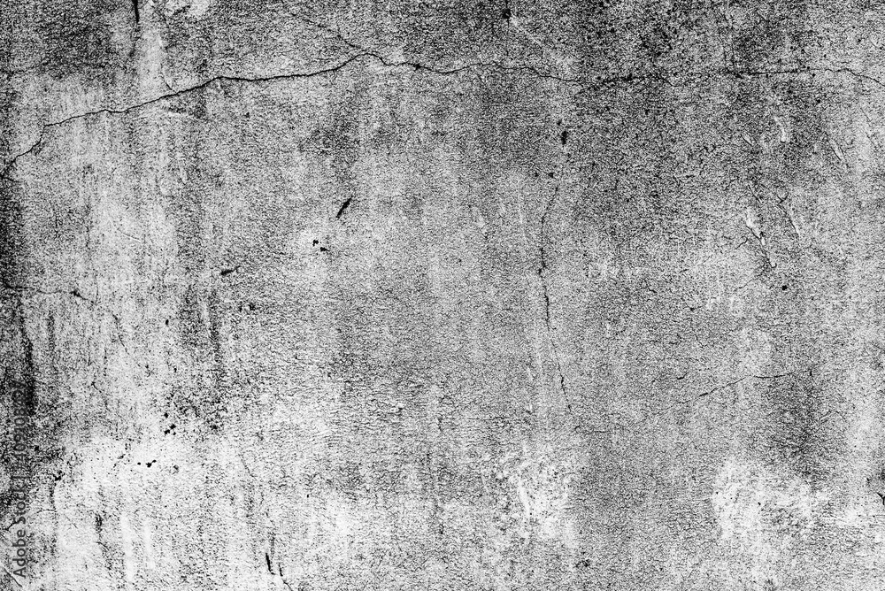 Fototapeta premium Texture of a concrete wall with cracks and scratches which can be used as a background