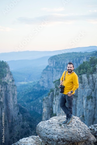 A photographer on the cliffs in Tazi Canyon in Antalya