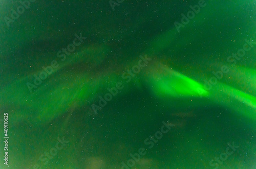 Aurora borealis in the sky at night. © Moroshka