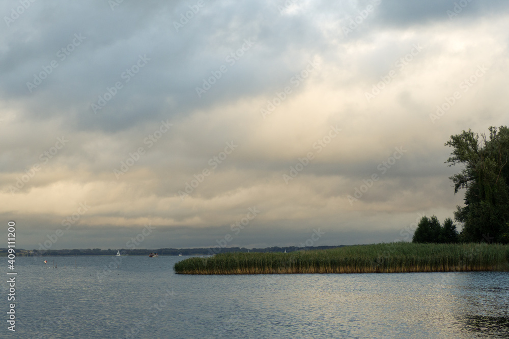 Niegocin lake lanscape during cloudy day. Masuria in Poland