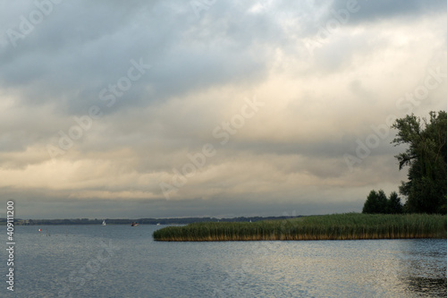 Niegocin lake lanscape during cloudy day. Masuria in Poland © Pawel S
