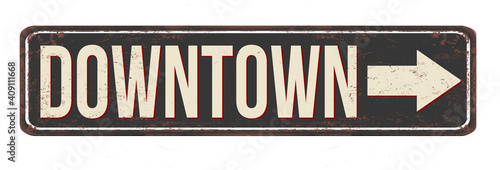 Downtown vintage rusty metal sign