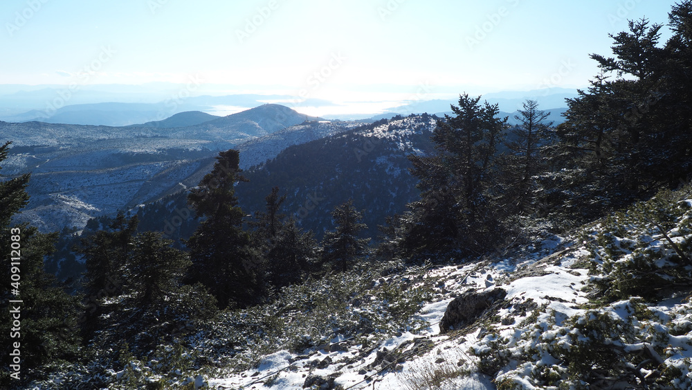 Breathtaking scenic view to whole Athens - Attica from snowed peak of Parnitha mountain, Greece Breathtaking scenic view to whole Athens - Attica from snowed peak of Parnitha mountain, Greece