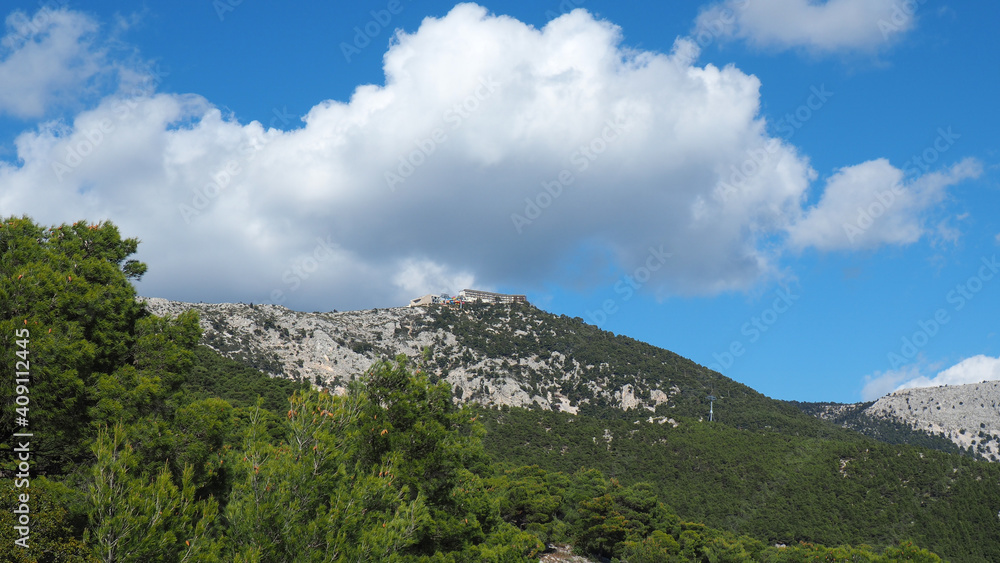 Beautiful mountain of Parnitha on a winter cloudy morning with clear blue sky, Attica, Greece