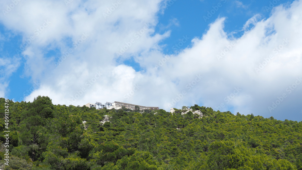 Beautiful mountain of Parnitha on a winter cloudy morning with clear blue sky, Attica, Greece