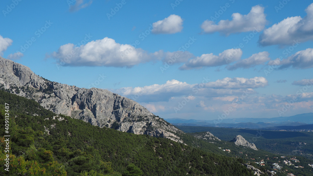 Naklejka premium Beautiful mountain of Parnitha on a winter cloudy morning with clear blue sky, Attica, Greece