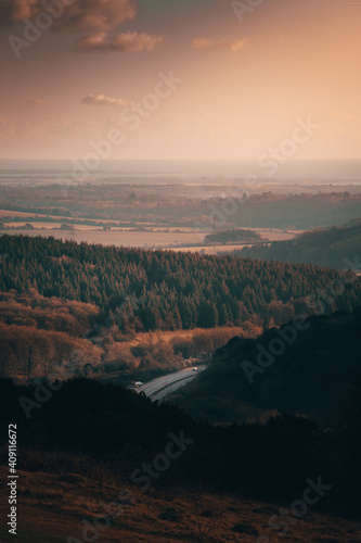 Over looking the South Coast country side during a sunset on a winters day. Cold winters day looking out of the hills of the south coast enjoying the calm natural views.
