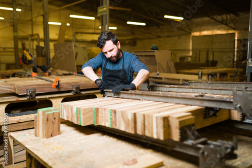 Hispanic male worker working on a carpentry project
