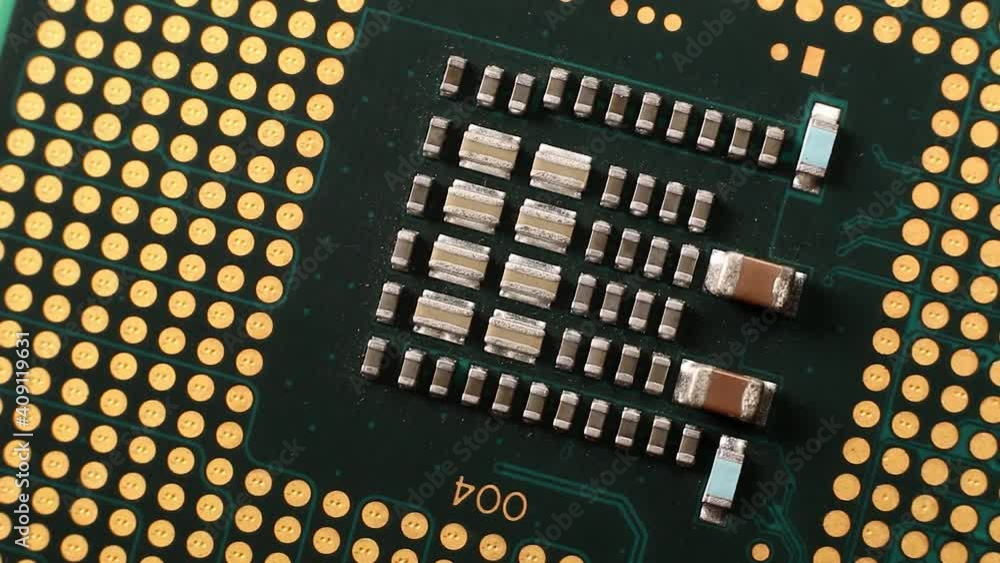 Macro close up of a desktop micro processor CPU rotating 360 Macro close up of a desktop micro processor CPU rotating 360