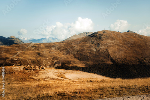 vintage photo of a mountain landscape in the lombardy region of the italian alps.