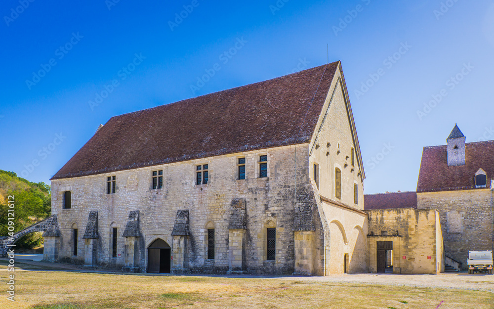 the exterior of the Noirlac abbey, a monastery situated in Berry region (France)