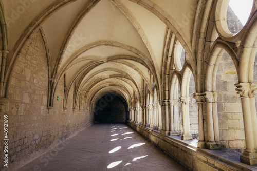 the alley of the gothic cloister of the Noirlac abbey  a monastery situated in Berry region  France 