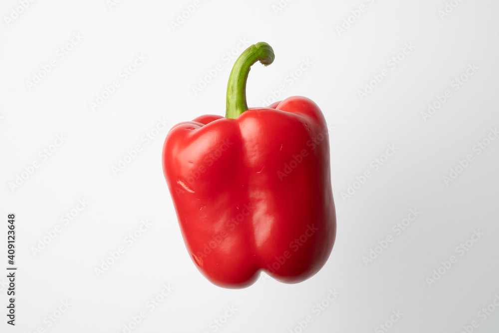 Red bell pepper shot in the studio on a white background Red bell pepper shot in the studio on a white background