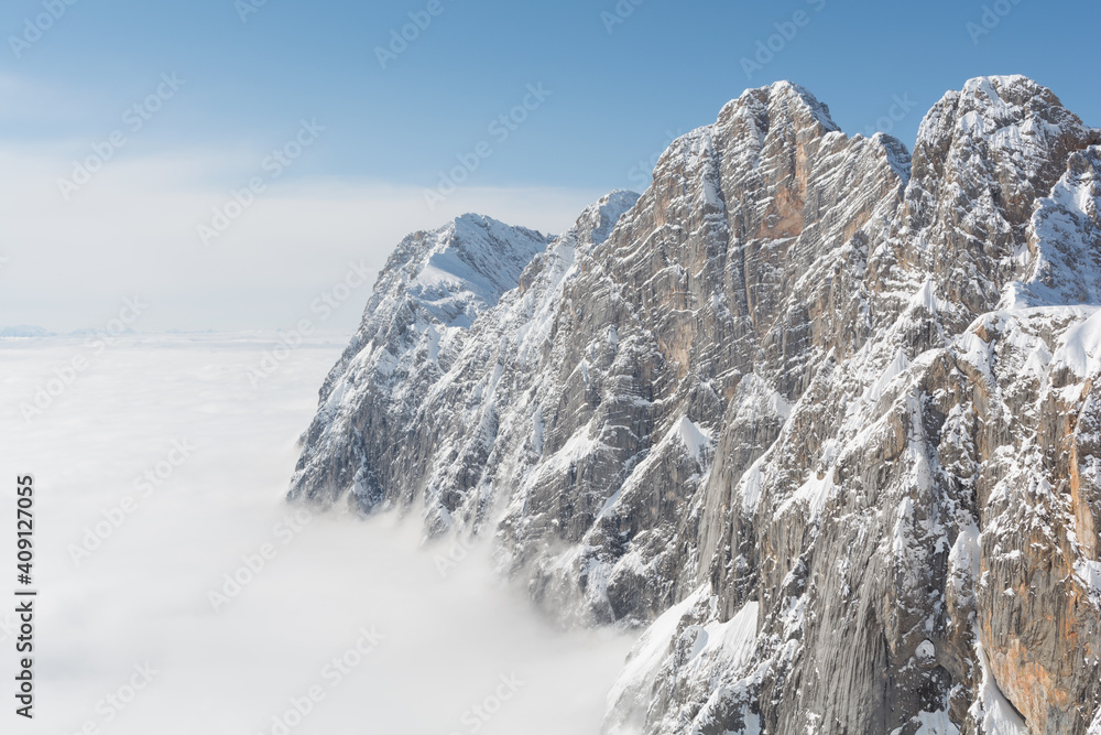 Dachstein Mountains In Beautiful Weather On A Sea Of Fog