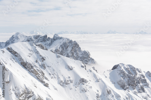 Sunny Dachstein Mountains Above The Sea Of Fog © Stockfotos