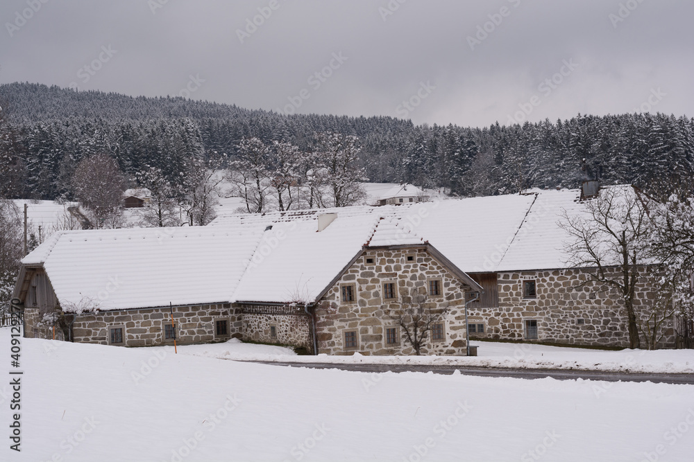 Old Farm Houses With Stone Walls In Snowy Winter Landscape