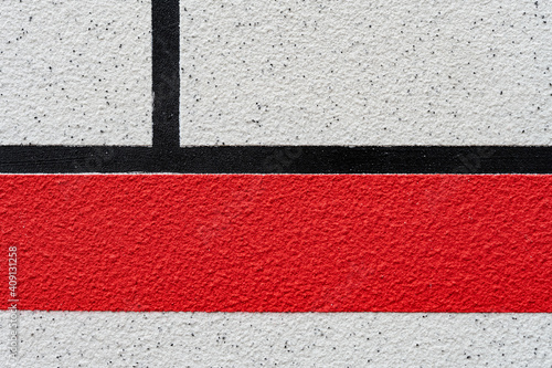 rough wall with red and white colors as texture and background horizontal composition