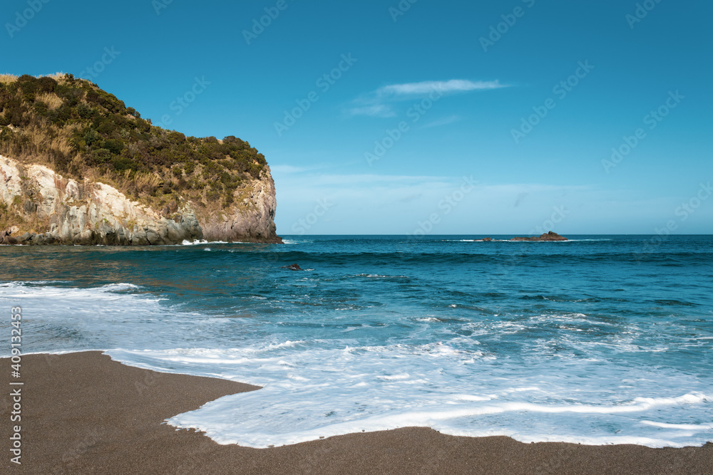 Porto Formoso beach, black sand, waves, landscape, Azores, Sao Miguel island. Porto Formoso beach, black sand, waves, landscape, Azores, Sao Miguel island.