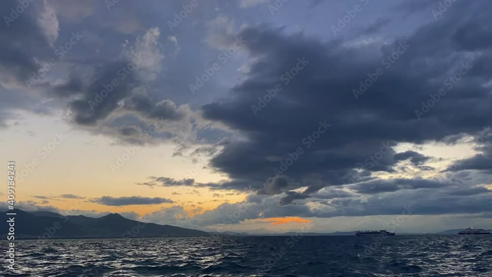 time lapse of clouds and sunset over Aegean sea time lapse of clouds and sunset over Aegean sea